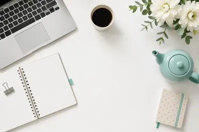 Minimal White Desk with Laptop and Coffee