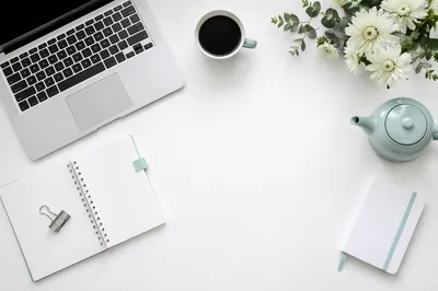 Minimal White Desk With Laptop and Coffee