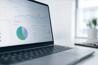 Laptop Analytics Dashboard on Modern Office Desk