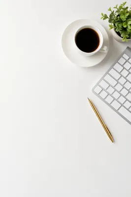 Minimalist Business Desk with Coffee and Plant