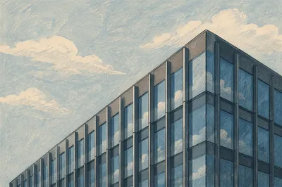 Modern Glass Office Facade Under Pale Sky