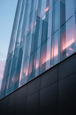Modern Glass Office Facade at Dusk