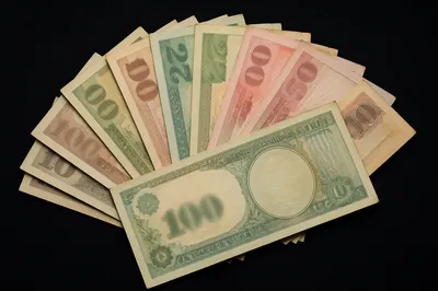 Fan Shaped Banknotes on Matte Black Background