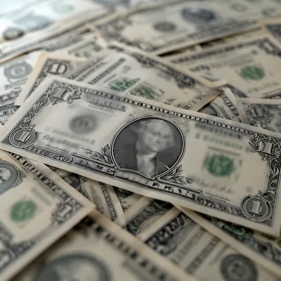Macro Close-Up of Scattered Dollar Bills