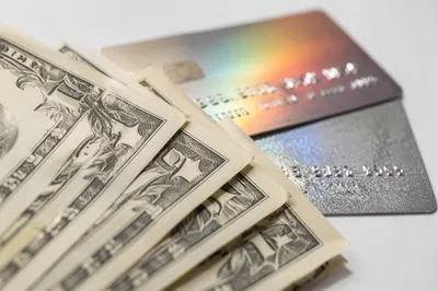 Dollar Bills and Payment Cards Closeup
