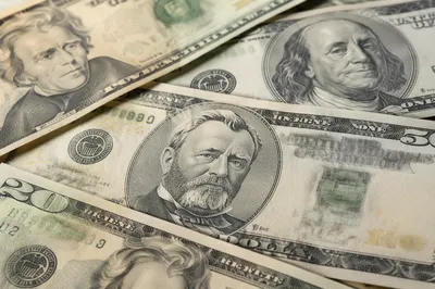 Photorealistic Layered Dollar Bills Background