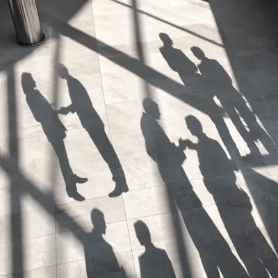 Overhead Networking Event Shadows in Conference Hall