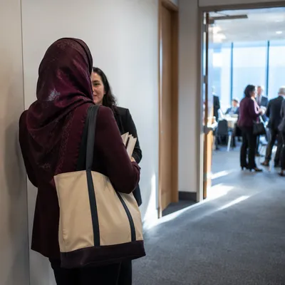 Professional Networking Hallway Conference Moment