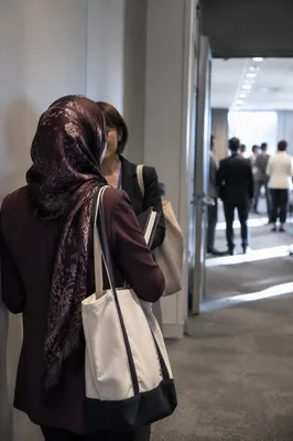 Professional Networking Event in Conference Hallway
