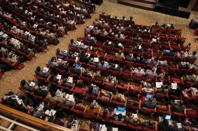 Professional Conference Audience in Modern Auditorium