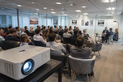 Professional Networking Conference in Modern Meeting Room