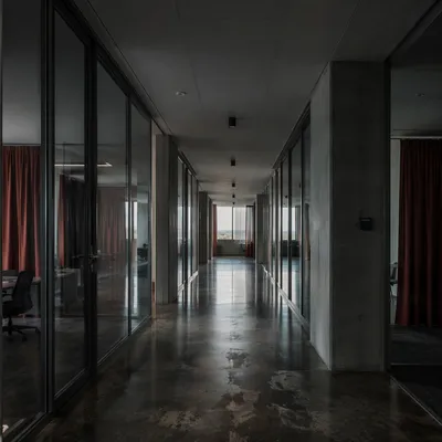 Modern Glass Office Corridor Perspective