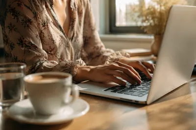 Modern Laptop Desk with Warm Coffee
