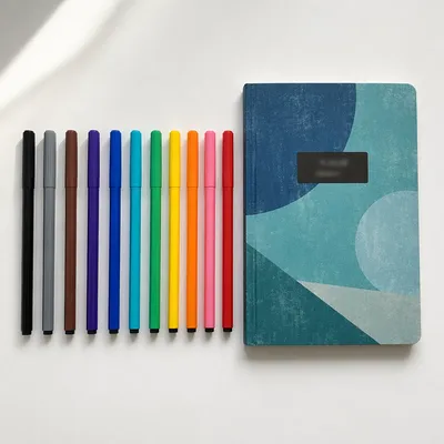 Organized Minimal Desk with Colorful Pens