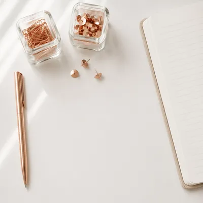 Minimal Organized Desk with Notebook and Pen