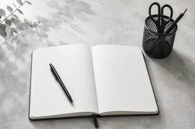 Minimal Organized Desk with Notebook and Pen
