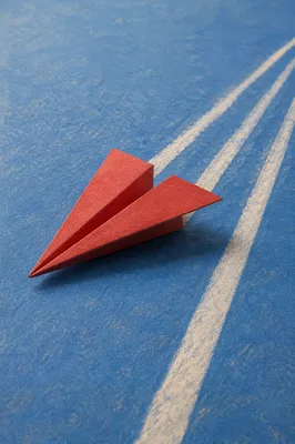 Red Paper Airplane Innovation Concept