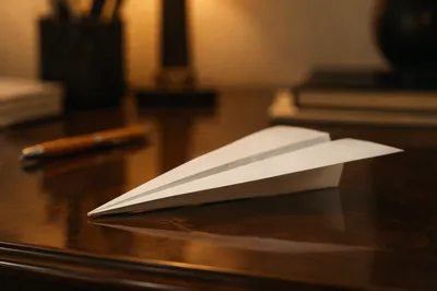 Paper Airplane Creativity on Office Desk
