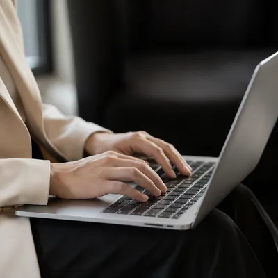 Professional Writing Email on Laptop