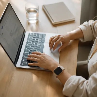 Professional Email Writing on Laptop