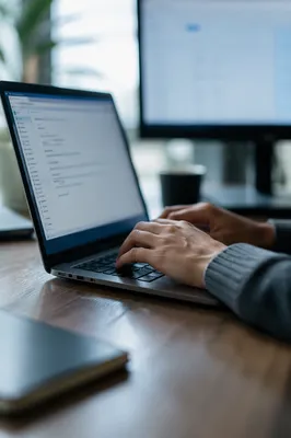 Professional Email Writing on Laptop