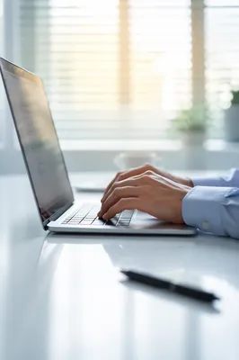 Professional Typing Email at Modern Office Desk