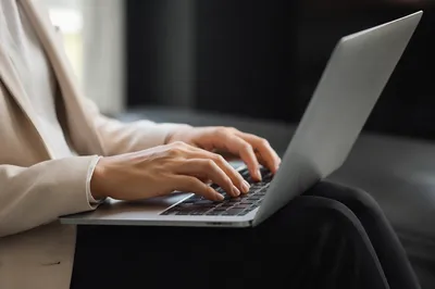 Professional Email Writing on Laptop