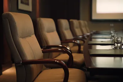 Dim Executive Conference Room Presentation Setup