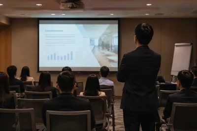 Business Seminar Projection in Dark Conference Room
