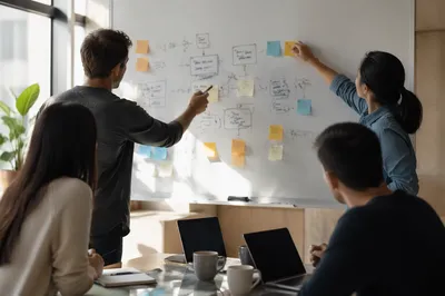 Collaborative Team Brainstorm at Office Whiteboard