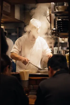 Busy Restaurant Chef in Steamy Kitchen