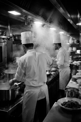 Busy Restaurant Kitchen Chefs Cooking Service