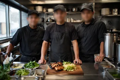 Restaurant Kitchen Team Preparing Fresh Meals
