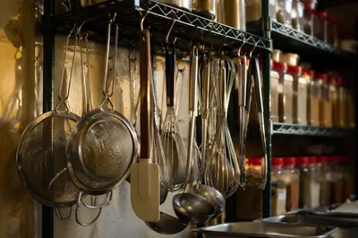 Busy Restaurant Kitchen Utensils in Warm Light