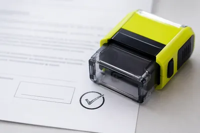 Lime Rubber Stamp on Approval Document