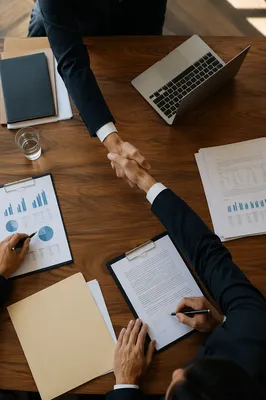 Business Contract Signing and Handshake Meeting