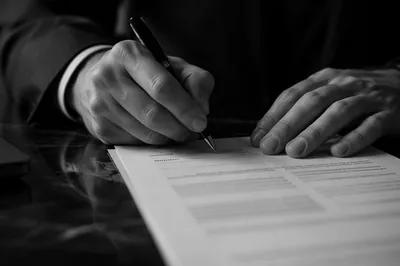 Signing a Business Contract with Pen