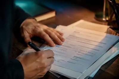 Signing Business Contract With Pen
