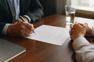 Professional Contract Signing in Trustful Business Meeting