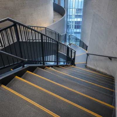 Ascending Staircase in Modern Office Interior