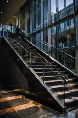 Ascending Staircase in Modern Corporate Atrium