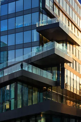 Ascending Glass Terraces on Modern Office Tower