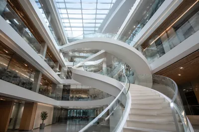Modern Office Atrium Spiral Staircase Ascending