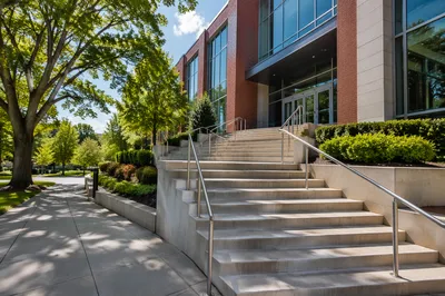 Ascending Stairs to Modern Office Entrance
