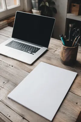 Startup Garage Workspace with Laptop and Sketchpad