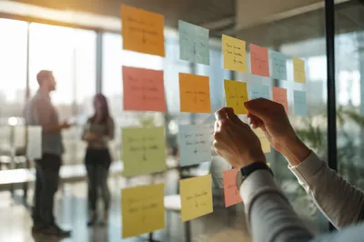 Colorful Sticky Notes on Glass Wall