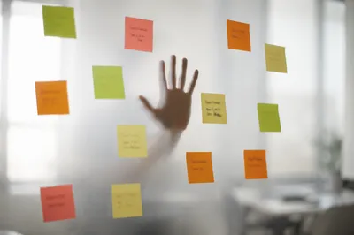 Colorful Sticky Notes on Frosted Glass