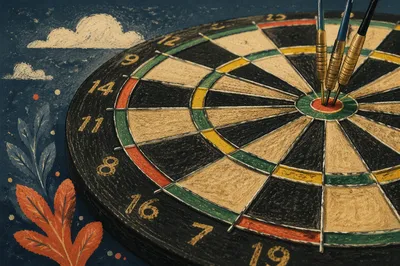 Darts Hitting Bullseye for Business Goals