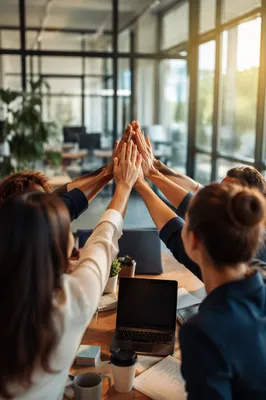 Office Team Celebrating Success with High Five