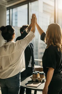 Team Celebrating Success with Office High Five
